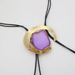  Lucky Lake Necklace close-up — handmade brass bolo necklace with raw gemstone slice, artisan boho jewelry made in Greece