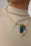  Pond Necklace — handmade brass half-moon pendant necklace with raw gemstone on wire collar, on model close-up