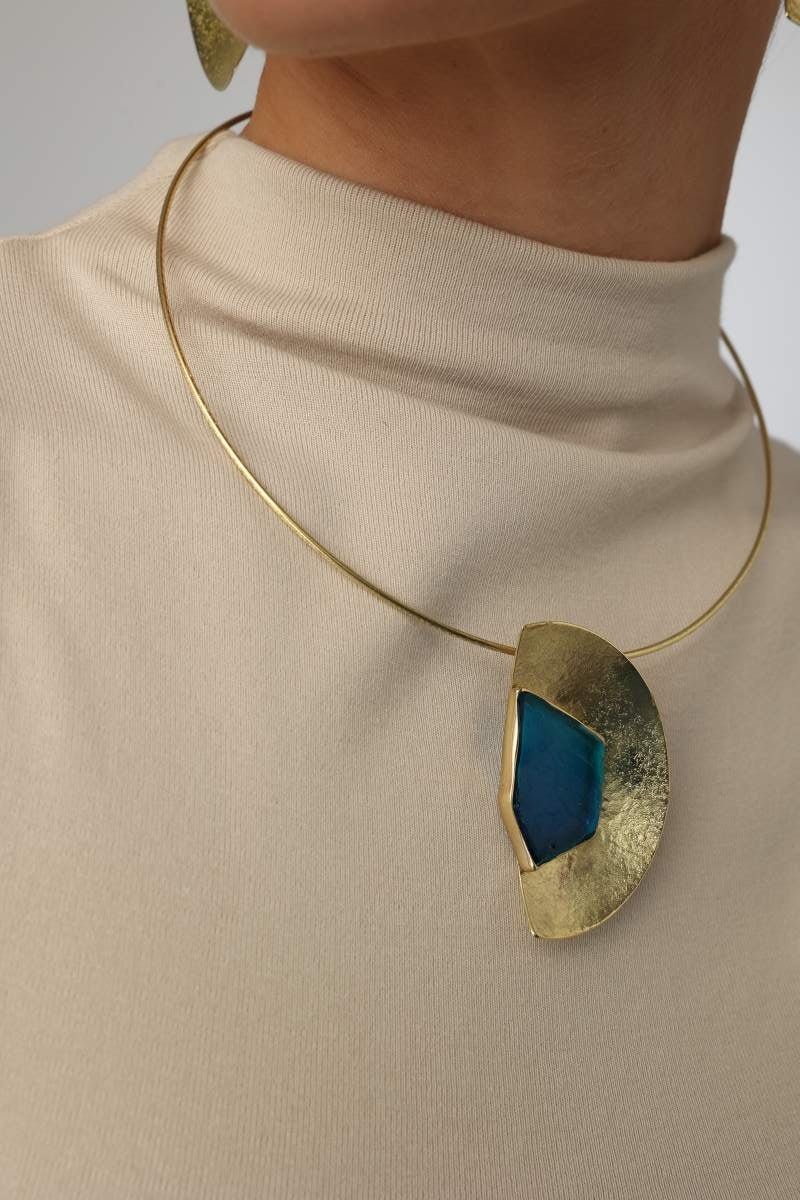  Pond Necklace — handmade brass half-moon pendant necklace with raw gemstone on wire collar, on model close-up