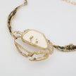 Crasta Necklace close-up — handmade brass sculptural crab statement necklace with natural stone, artisan jewelry made in Greece