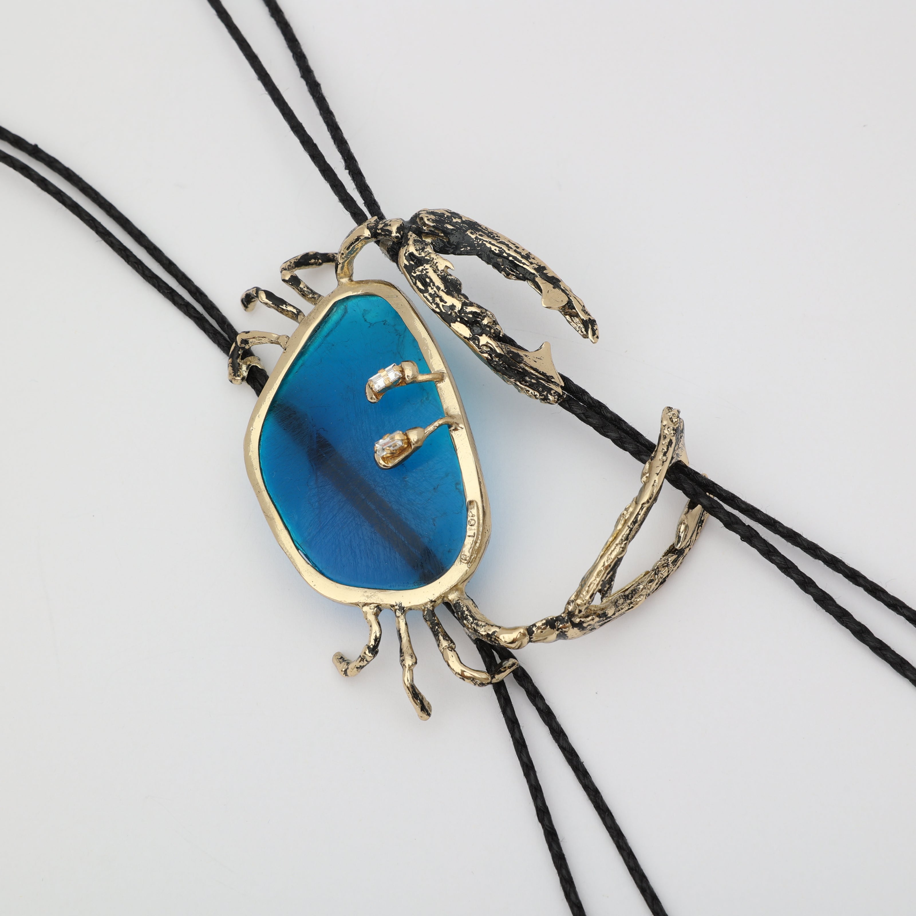 Long Crasta Necklace — handmade brass crab pendant necklace with resin stone and crystal baguettes on black cord