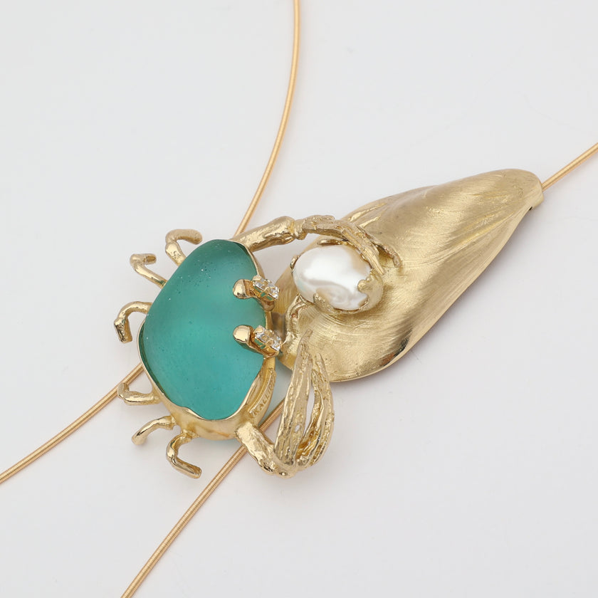 Claw Crabby Necklace side view — handmade brass sculptural necklace with crab, shell and pearl detail on fine chain