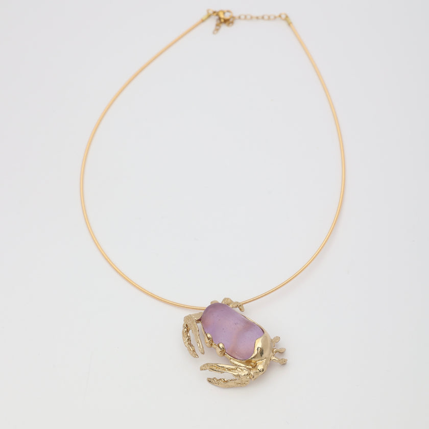 Crabby Necklace  view — handmade brass sculptural crab necklace with organic resin stone body on wire collar
