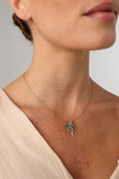 Astel Necklace — handmade brass enamel starfish pendant necklace on model, close-up