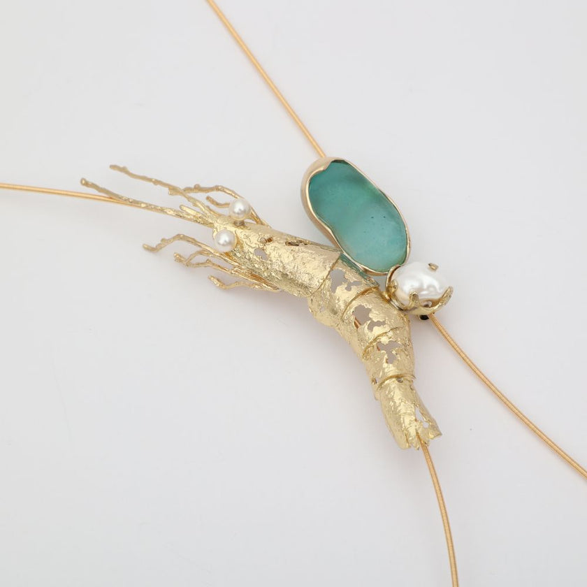 Pebble Shrimp Necklace — handmade brass sculptural shrimp pendant with sea glass and freshwater pearls, artisan jewelry made in Greece