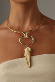  handmade brass sculptural torque statement necklace with goddess pendant on model, front view