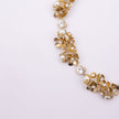 Handmade brass floral necklace with pearl and crystal detail