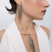 Model wearing the Pine green patina statement necklace with matching long earrings, Savage Flora