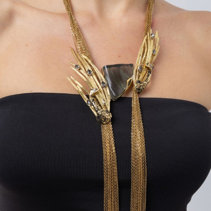 Close-up of the Double Peacock necklace with two oxidized peacocks, grey resin stone and teardrop crystals, Savage Flora