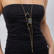 Glow Long Necklace on model: handmade brass long necklace worn showing length and proportion