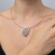 Sparkle Necklace on model: handmade brass angular pendant necklace with sparkling crystals on a slim cord