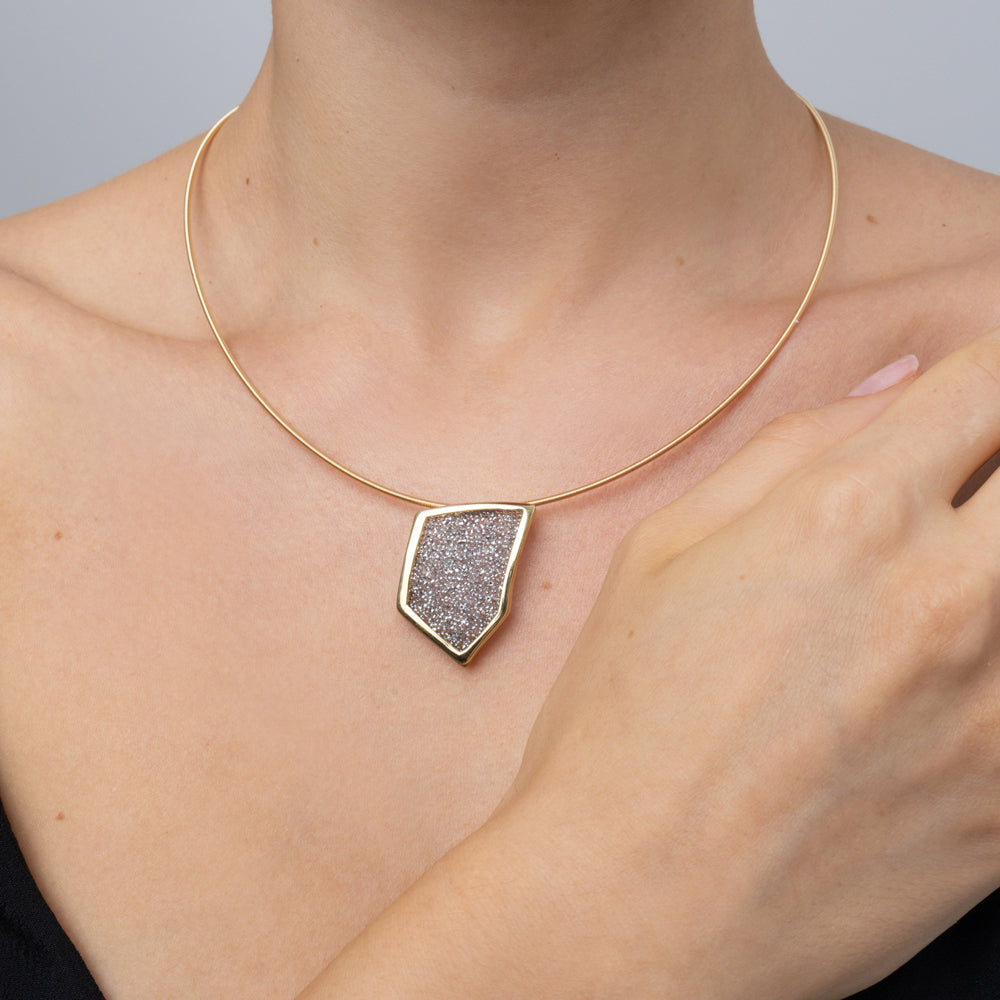 Sparkle Necklace on model: handmade brass angular pendant necklace with sparkling crystals on a slim cord