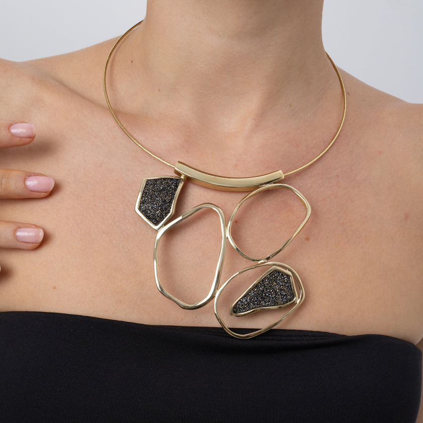 Glow Necklace on model: handmade brass sculptural collar necklace with sparkling crystals close up