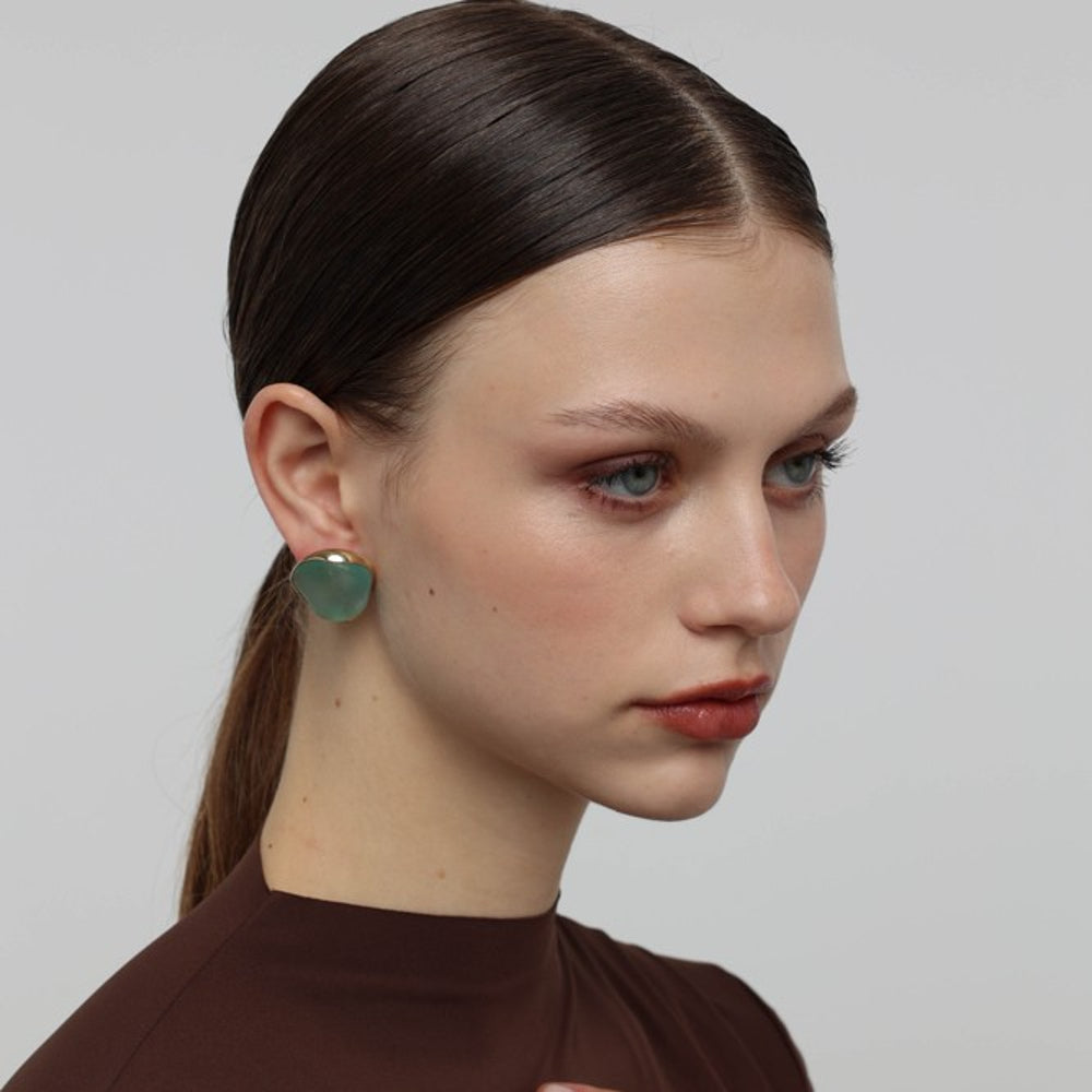 Stoneveil Earrings side view — handmade brass earrings with organic irregular silhouette