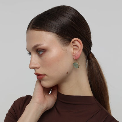 Kiss Earrings side view — handmade brass drop earrings with organic pebble shaped resin stone