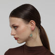 Kiss Hoop Earrings side view — handmade brass open hoop earrings with organic pebble shaped resin stone