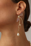 Buzz Earrings on model — artisan brass dragonfly statement earrings with enamel and pearl drops