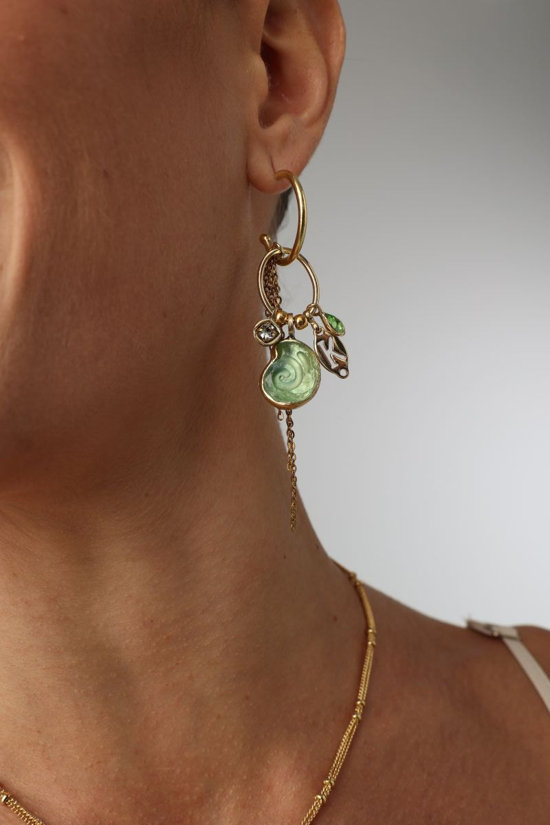 Shelly Earring — handmade brass charm hoop earrings with shell and chain tassel on model, full view