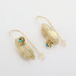 Limpet Earring — handmade brass limpet shell drop earrings with teal crystal detail, artisan jewelry made in Greece