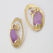 Pulse Earring — handmade brass gemstone earrings with oval frame and raw stone, crystal accent flat lay