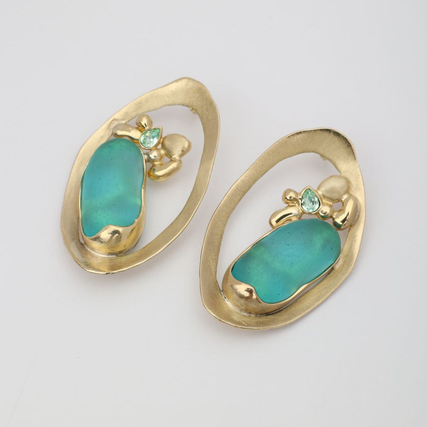 Pulse Earring — handmade brass oval frame stud earrings with raw gemstone and crystal detail, artisan jewelry made in Greece