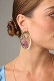  Pulse Earring — handmade brass gemstone stud earrings with open oval frame and raw amethyst stone on model