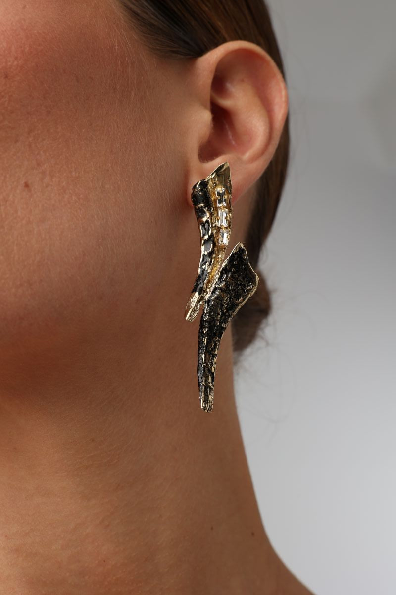 Sparkly Nerra Earring — handmade brass twisted sculptural earrings with baguette crystals, oxidized finish on model close-up