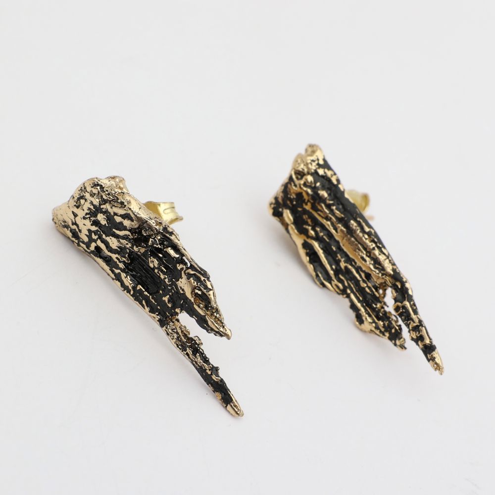 Dragonfish Earring — handmade brass sculptural stud earrings with oxidized finish, flat lay close-up