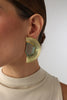Pond Earring — handmade brass half-moon gemstone stud earrings on model, bold artisan jewelry made in Greece