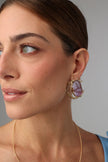 Crabby Earring — handmade brass crab stud earrings with gemstone body on model, artisan jewelry made in Greece
