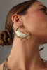 Claw Crabby Earring — handmade brass oversized crab statement earrings with white stone shell on model