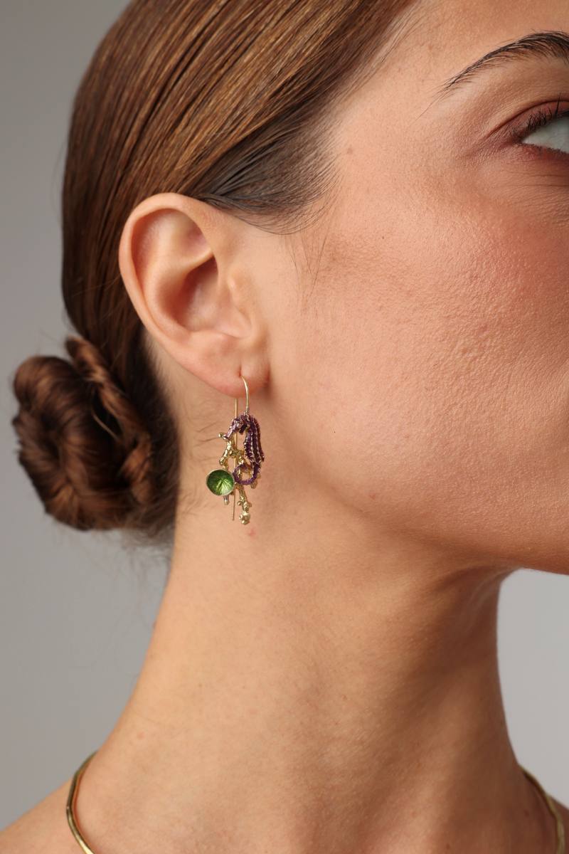 Coralia Earring — handmade brass seahorse drop earrings with enamel and shell charm on model