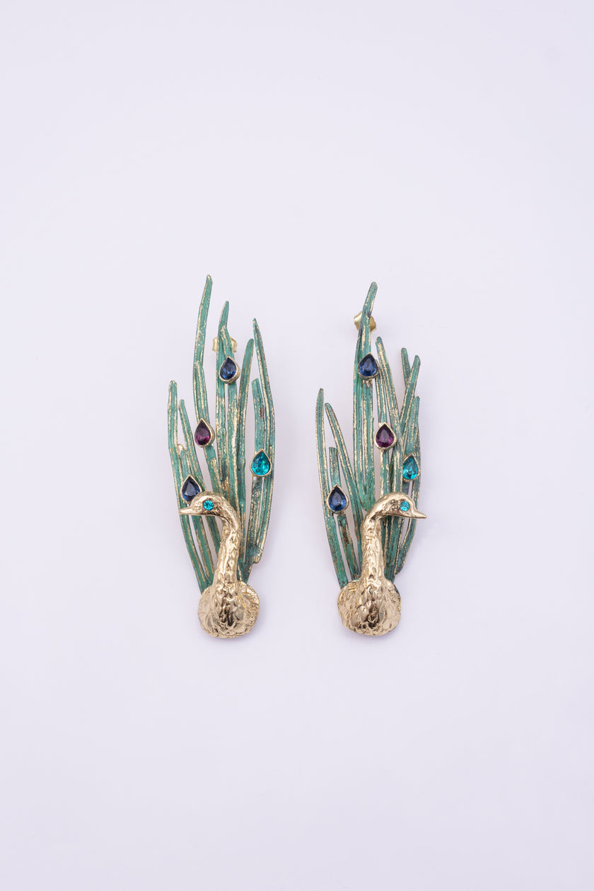 Peacock Earrings, handmade brass long drop earrings with sculpted peacock, patinated feather blades and teardrop crystals on white background
