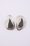 Shimmer Earrings close up: handmade brass earrings with tiny faceted crystals set in a sculpted bezel