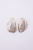 Shimmer Earrings detail: handmade brass earrings with post backs and floating crystal centerpiece