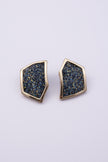 Sparkle Earrings on white background: handmade brass geometric statement earrings with crystal inset