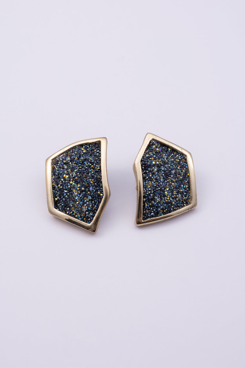 Sparkle Earrings on white background: handmade brass geometric statement earrings with crystal inset