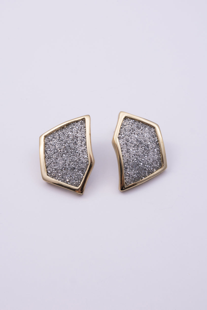 Sparkle Earrings front view: handmade brass angular earrings with faceted crystal surface