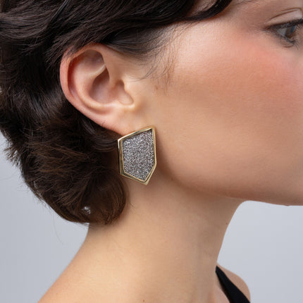 Sparkle Earrings on model: handmade brass boho statement earrings with angular frame and crystal inset