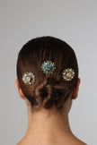 Individual handmade bronze hair comb featuring blue and white crystals on a white background.