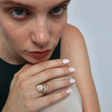 Handmade gold-tone brass multi-strand twig ring with large baroque pearl worn on hand — Sec Ring by Kalliope Jewelry, crafted in Greece